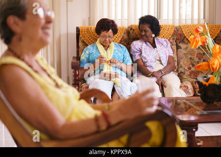Senior Woman In Hospice Knitting Whool Stock Photo
