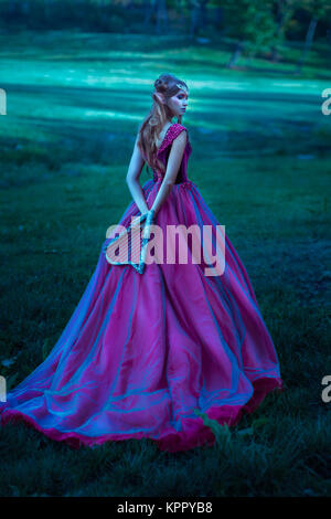 Elf woman in violet dress Stock Photo