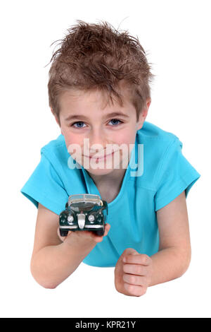 Little boy with toy car Stock Photo