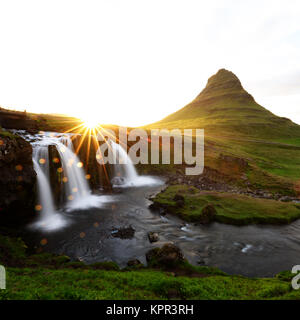 Colorful sunrise on Kirkjufellsfoss waterfall Stock Photo