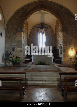 Monteriggioni - Santa Maria church. This church located in Piazza Roma, was built in the 13th century Stock Photo