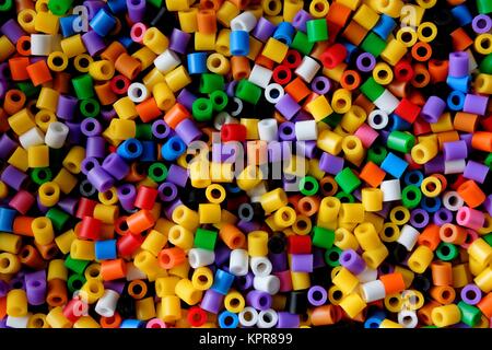 abstract background of close up multi colored beads Stock Photo