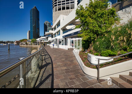 Modern high-rise buildings at Eagle Street Pier beside river in Brisbane CBD Queensland Australia Stock Photo