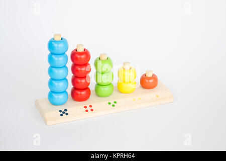 Colorful backgammon wooden toy on white table Stock Photo