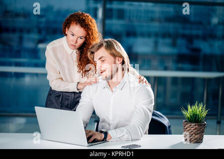 We already have great results. woman pointing at laptop Stock Photo