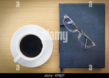 Coffee on wood table and glasses Stock Photo