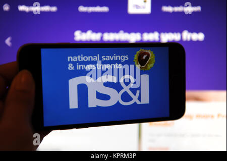 The National Savings & Investments (NS&I) logo on a phone and the Stock ...