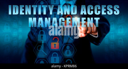 Manager Touching IDENTITY AND ACCESS MANAGEMENT Stock Photo