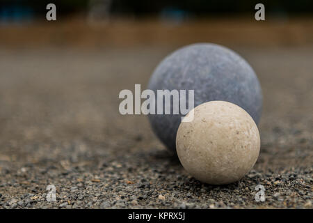 White Bocce Ball with Blue Ball Close Copy Space Left Stock Photo