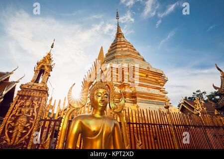 Buddhist Wat Phra That Doi Suthep Temple at the sunset. Tourists favorite landmark in Chiang Mai, Thailand.