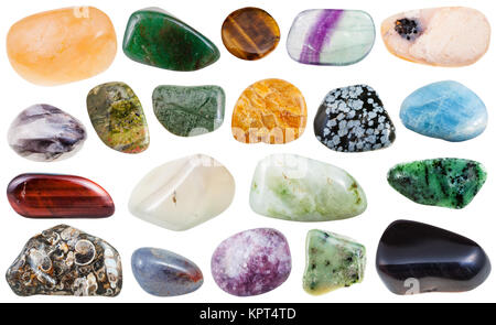 set of various polished natural mineral stones and gemstones - clinohumite, zoisite, snowflake obsidian, unakite, iolite, aventurine, fluorite, aquamarine, beryl etc isolated on white background Stock Photo