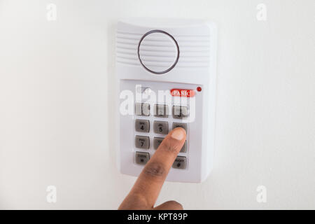 Businesswoman Hand Using Door Security System Stock Photo