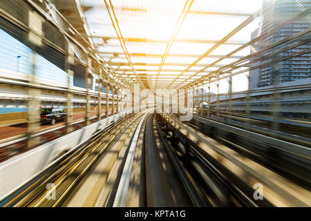 Motion blur of Japanese mono rail at day time Stock Photo