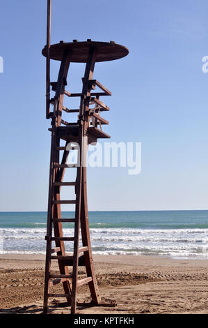 A lifeguard tower to protect the swimmers in the beach Stock Photo
