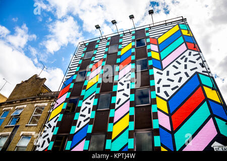 Colourful Building Painted With Graphic Zig zag Patterns By Artist colourful-building-painted-with-graphic-zig-zag-patterns-by-artist