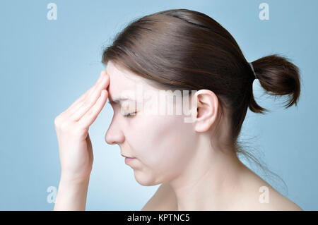 Woman suffering from headache Stock Photo
