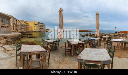 Empty outdoor cafe in the morning, Chania, Crete Stock Photo