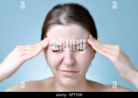 Woman suffering from headache Stock Photo