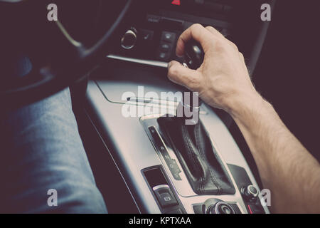 Hand on gear stick Stock Photo