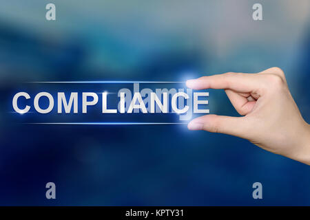hand clicking compliance button Stock Photo