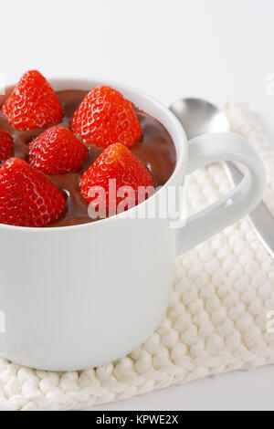 strawberries in chocolate pudding Stock Photo