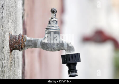 closeup of a faucet outside Stock Photo