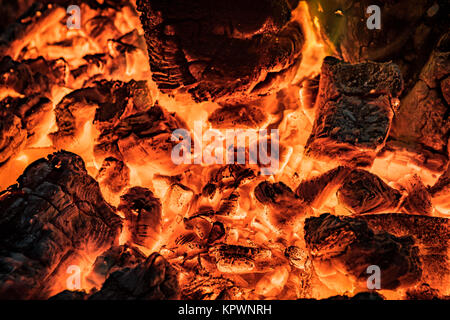 wood fire-burning embers in close-up Stock Photo