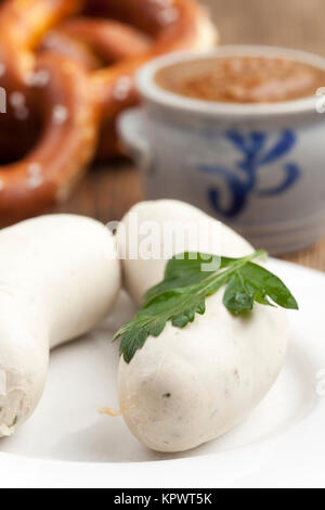bavarian veal sausages with pretzel Stock Photo