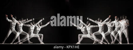 Duel fencers on a black background. collage of photos taken with stroboscope Stock Photo