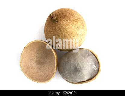 Two Dimocarpus Longan fruit with sheel half peel showing translucent flesh isolated on white background Stock Photo