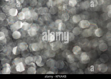 background-blurry glittering dots on frozen water Stock Photo