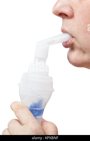 mouthpiece of jet inhaler in lips of woman Stock Photo