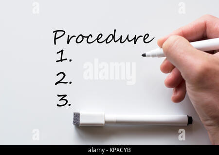 Procedure written on whiteboard Stock Photo