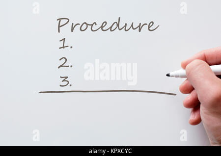 Procedure written on whiteboard Stock Photo