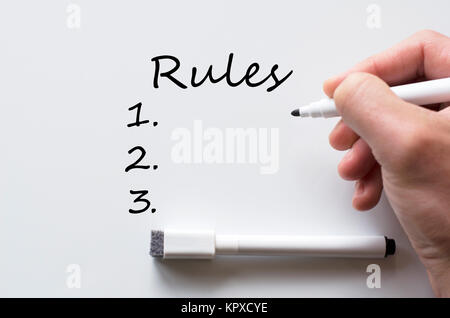 Rules written on whiteboard Stock Photo