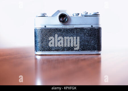 Back view of vintage rangefinder camera background Stock Photo