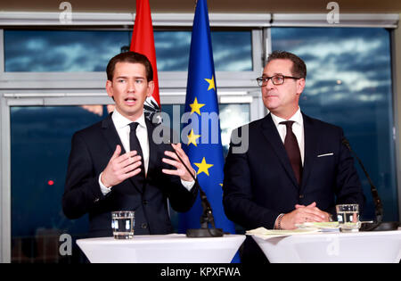 Vienna, Austria. 16th Dec, 2017. Sebastian Kurz (L), leader of the People's Party, and Heinz-Christian Strache, leader of the Freedom Party, attend a press conference in Vienna, capital of Austria, Dec. 16, 2017. The People's Party and the Freedom Party will form a coalition government for the coming five years. Sebastian Kurz will be the chancellor and Heinz-Christian Strache will be the vice chancellor. Credit: Pan Xu/Xinhua/Alamy Live News Stock Photo