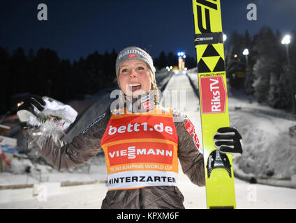 Hinterzarten, Germany. 17th Dec, 2017. Maren Lundby from Norway celebrating her victory at the FIS Ladies Ski Jumping World Cup in Hinterzarten, Germany, 17 December 2017. Credit: Felix Kästle/dpa/Alamy Live News Stock Photo