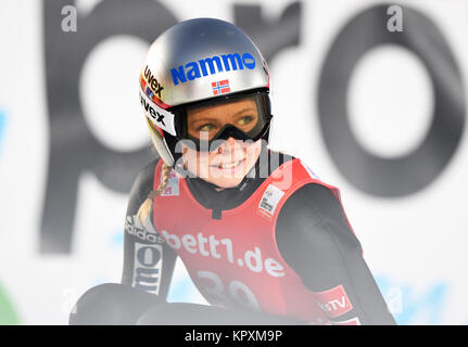 Hinterzarten, Germany. 17th Dec, 2017. Maren Lundby from Norway celebrating her victory at the FIS Ladies Ski Jumping World Cup in Hinterzarten, Germany, 17 December 2017. Credit: Felix Kästle/dpa/Alamy Live News Stock Photo