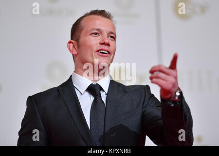 Former gymnast Fabian Hambuechen arrives at the Kurhaus for the election of 'Athlete of the year' in Baden-Baden, Germany, 17 December 2017. Photo: Uwe Anspach/dpa Stock Photo