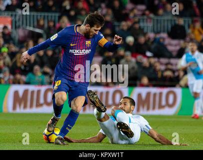 Barcelona, Spain. 17th Dec, 2017. FC Barcelona's Lionel Messi (L) competes during a Spanish League match between FC Barcelona and RC Deportivo in Barcelona, Spain, Dec. 17, 2017. Credit: Joan Gosa/Xinhua/Alamy Live News Stock Photo