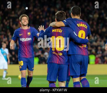 Barcelona, Spain. 17th Dec, 2017. FC Barcelona's Lionel Messi (C) and Luis Suarez (R) celebrate a goal during a Spanish League match between FC Barcelona and RC Deportivo in Barcelona, Spain, Dec. 17, 2017. Credit: Joan Gosa/Xinhua/Alamy Live News Stock Photo