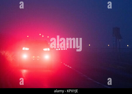 Southport, Merseyside. Dense Fog. 18th December 2017. UK Weather. Commuters on their way to work were met by very difficult driving conditions this morning as a blanket of dense fog descended along the north west coastline at Southport in Merseyside. Credit: Cernan Elias/Alamy Live News Stock Photo
