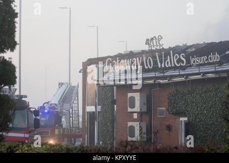 Fire and Rescue Service putting out large scale fire at the popular Gateway to Wales Hotel and Leisure during an overnight fire that completely gutted the hotel, Queensferry, Wales, UK Stock Photo