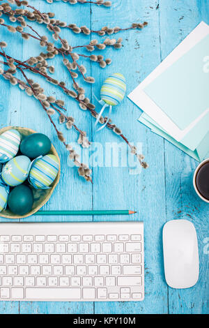 The top view of easter on wooden table office workplace Stock Photo