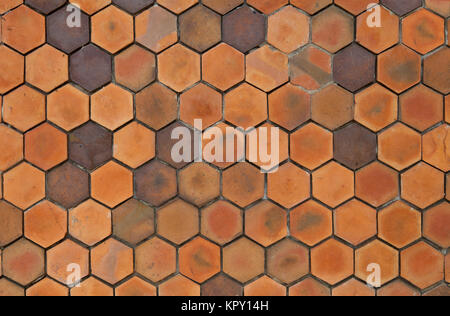 yellow hexagonal clay tile wall background, honeycomb tile abstract wall, , Terra Cotta tiles, earthenware Stock Photo