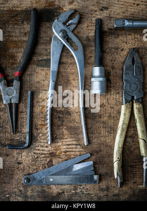 Tools on wooden plank Stock Photo