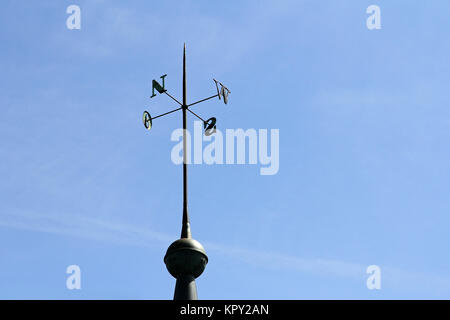 wrought iron display of cardinal directions on a tower Stock Photo