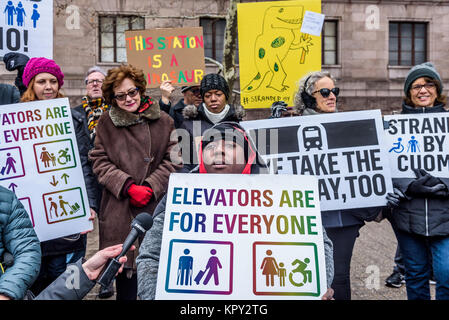 New York, United States. 16th Dec, 2017. Members of Rise and Resist, residents from across NYC, City Councilwoman Helen Rosenthal, and Susan Dooha, executive director of the Center for the Independence of the Disabled, New York (CIDNY), held a protest on December 16, 2017; outside the Museum of Natural History Subway Stop on Saturday to impress upon the city organization the importance of accessible subway stations. Credit: Erik McGregor/Pacific Press/Alamy Live News Stock Photo