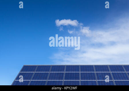 Solar panel against blue sky Stock Photo